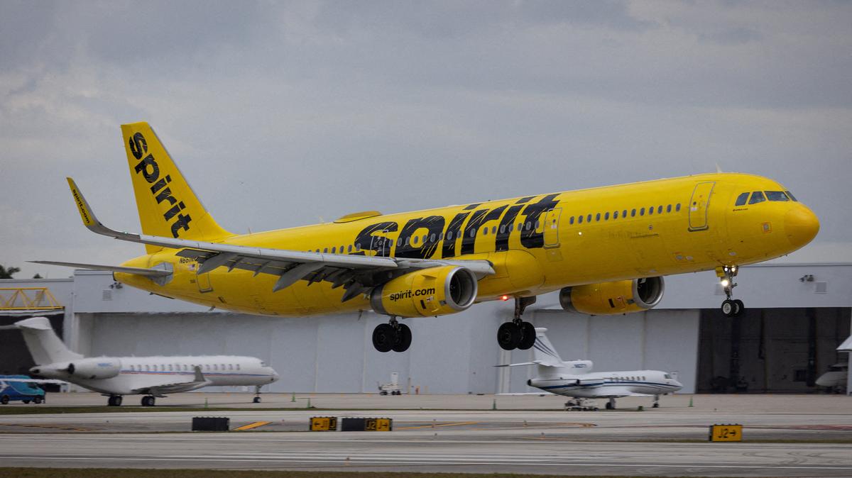 FILE PHOTO: A Spirit Airlines flight arrives at Fort Lauderdale - Hollywood International Airport, in Fort Lauderdale, Florida, U.S., April 23, 2026. REUTERS/Marco Bello/File Photo
