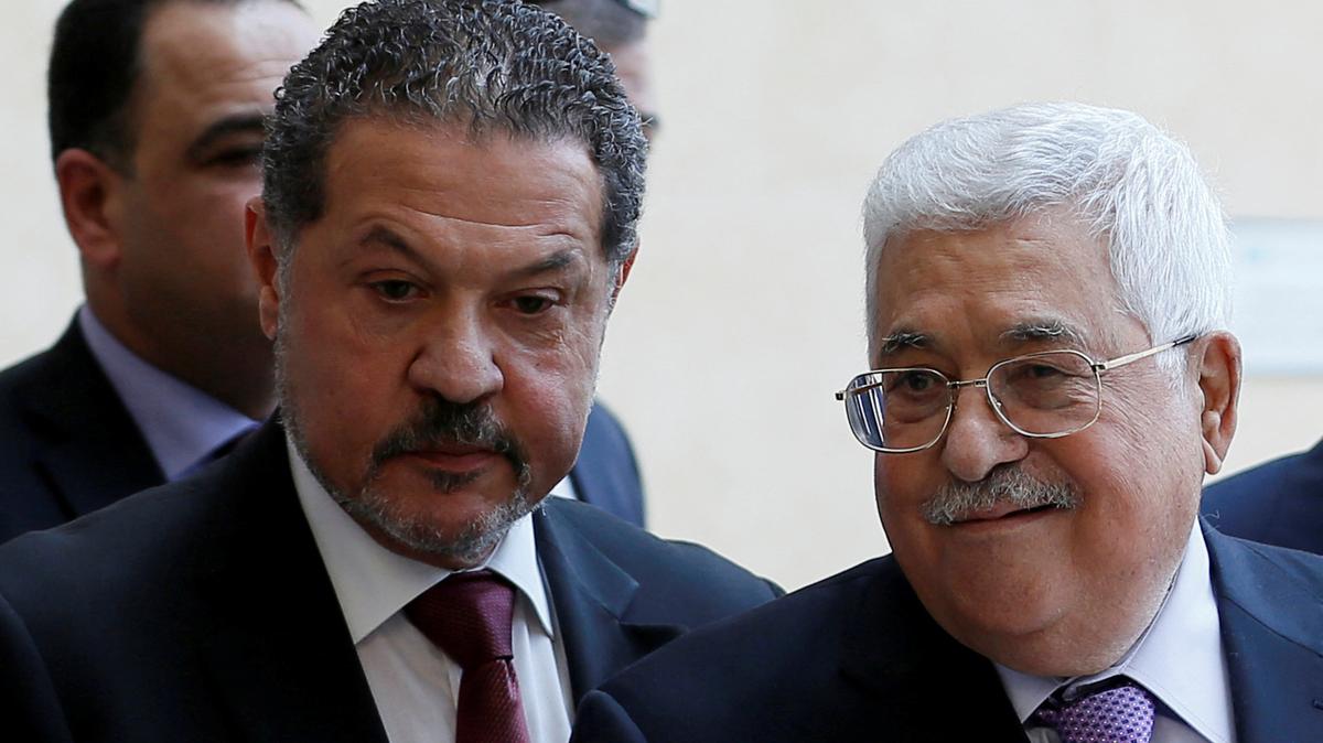 Palestinian President Mahmoud Abbas, accompanied by his son Yasser, leaves a hospital in Ramallah in the Israeli-occupied West Bank, May 28, 2018. REUTERS/Mohamad Torokman