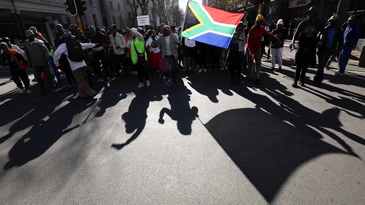 Anti-immigrant protesters march on the day of an unofficial deadline set by anti-immigrant groups for all undocumented migrants to leave, in Cape Town, South Africa, June 30, 2026. REUTERS/Esa Alexander