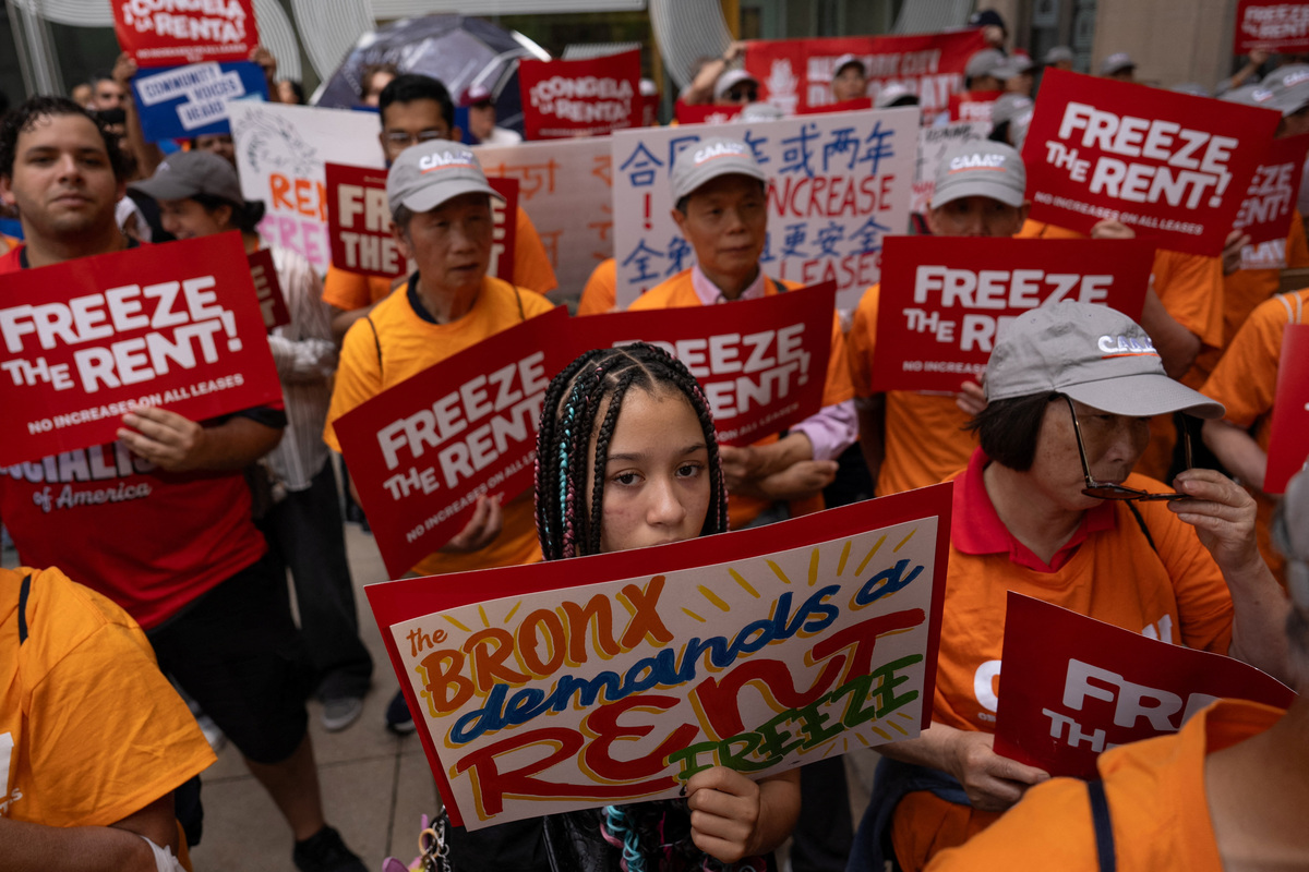 People attend a rally outside of El Museo Del Barrio for the final public hearing and vote of New York City's Rent Guidelines Board on rent-stabilized apartments, in New York City, U.S., June 25, 2026. REUTERS/David 'Dee' Delgado