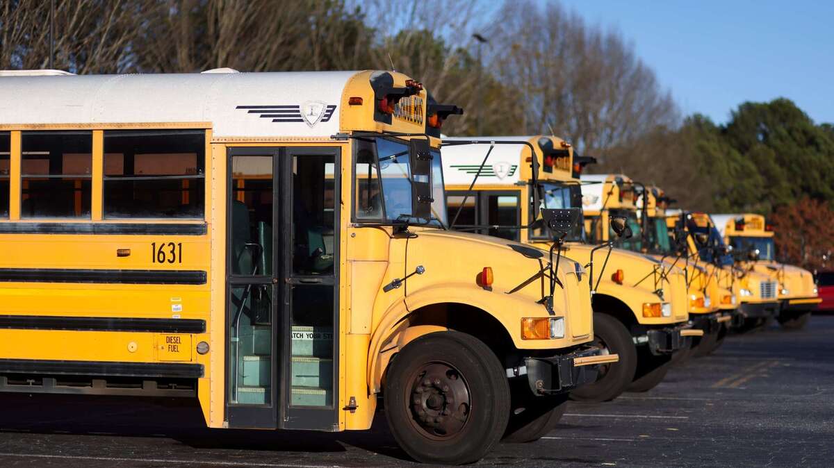 The Kansas City Police Department is investigating a school bus crash in Kansas City that left two adults and six children injured.