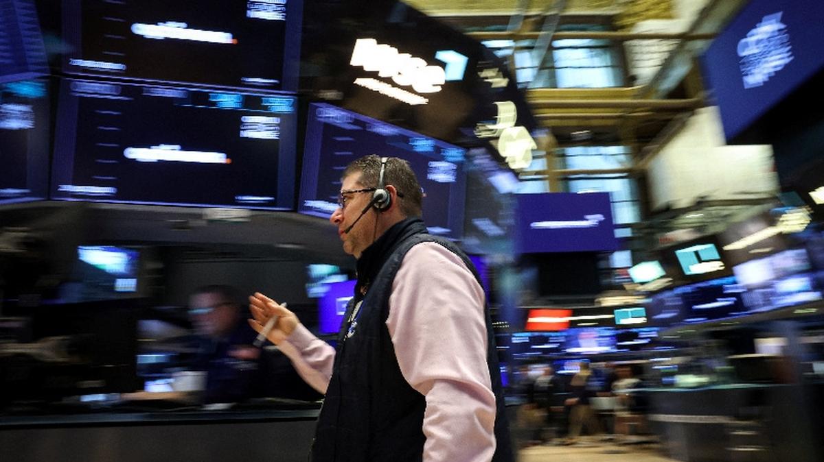 Traders work on the floor at the New York Stock Exchange (NYSE) in New York City, U.S., May 5, 2026.  REUTERS/Brendan McDermid