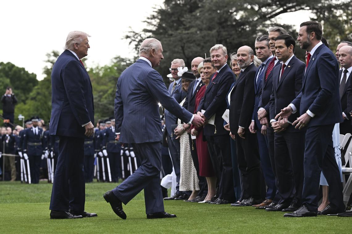 President Donald Trump watches as King Charles III greets Vice President JD Vance during an arrival ceremony on the South Lawn of the White House in Washington, on Tuesday, April 28, 2026. (Kenny Holston/The New York Times)