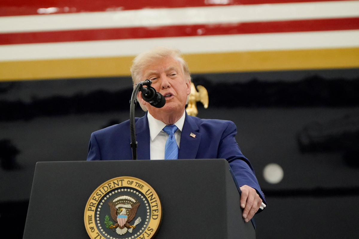 U.S. President Donald Trump delivers a speech as he stands in front of the VC-25B aircraft gifted by Qatar that will be used as Air Force One, at Joint Base Andrews, Maryland, U.S., June 19, 2026. REUTERS/Elizabeth Frantz