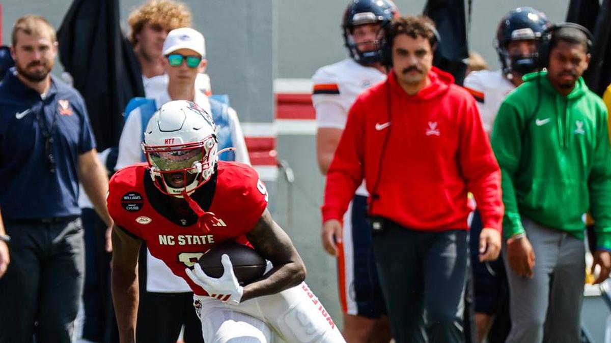  Sep 6, 2025; Raleigh, North Carolina, USA; North Carolina State Wolfpack wide receiver Terrell Anderson (9) runs with the football during the first half of the game against Virginia Cavaliers at Carter-Finley Stadium. Mandatory Credit: Jaylynn Nash-Imagn Images | Jaylynn Nash-Imagn Images 