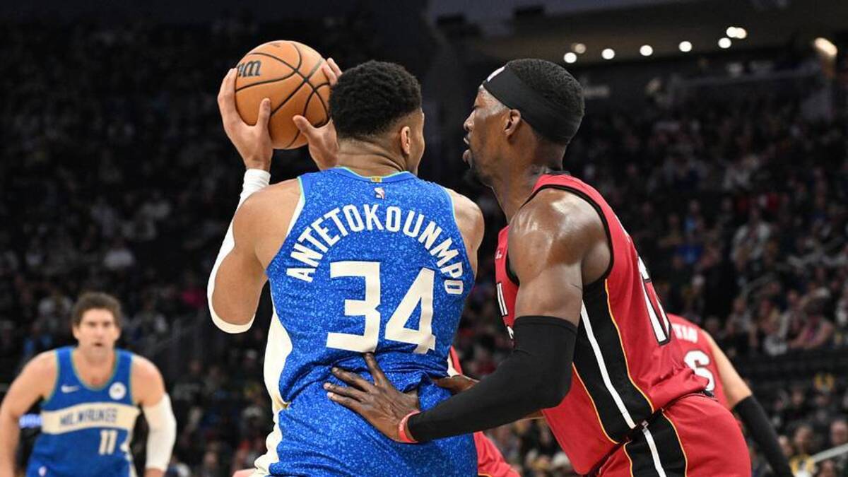 Feb 13, 2024; Milwaukee, Wisconsin, USA; Milwaukee Bucks forward Giannis Antetokounmpo (34) drives against Miami Heat center Bam Adebayo (13) in the first half at Fiserv Forum. Mandatory Credit: Michael McLoone-USA TODAY Sports | USA TODAY Sports via Reuters Connect 