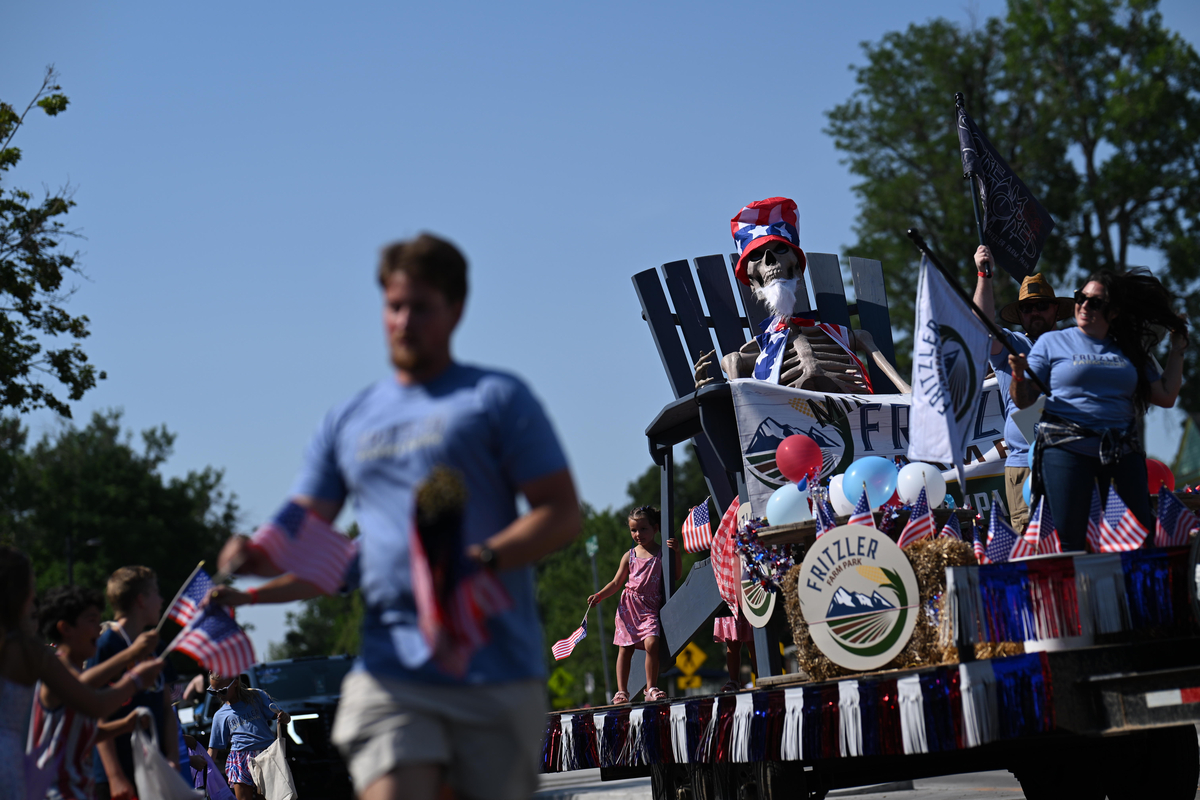 A float with a Uncle Sam skeleton in a lawn chair, during the Greeley Stampede's Independence Day parade in Greeley, Colo., July 4, 2026. America celebrates the 250th anniversary of its independence today, with people from one end of the country to the other marking the milestone with fireworks, parades and concerts. (Mark Makela/The New York Times)