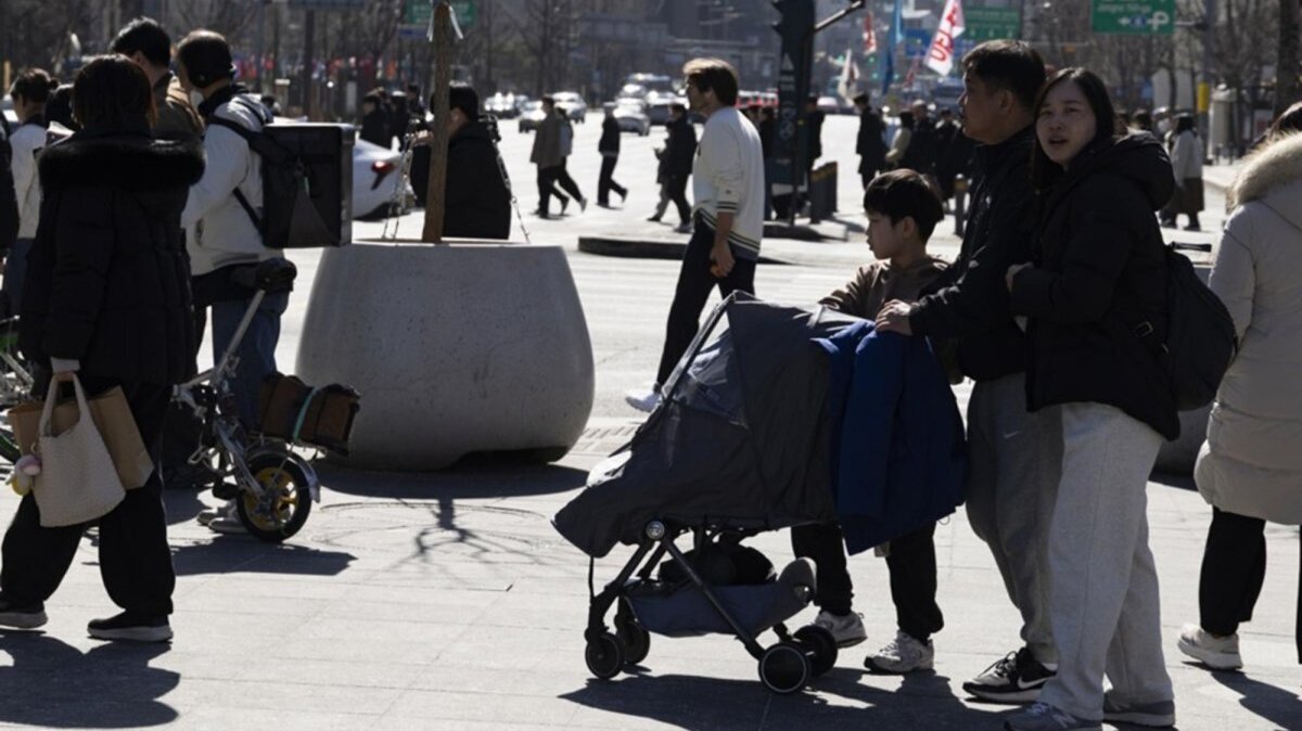A family walks with stroller in downtown Seoul, South Korea, 25 February 2026. According to data released by the Ministry of Data and Statistics, the number of births in South Korea in December 2025 reached 20,003, an increase of 1,747, or 9.6 percent, compared to the same month a year earlier. Photo by JEON HEON-KYUN / EPA