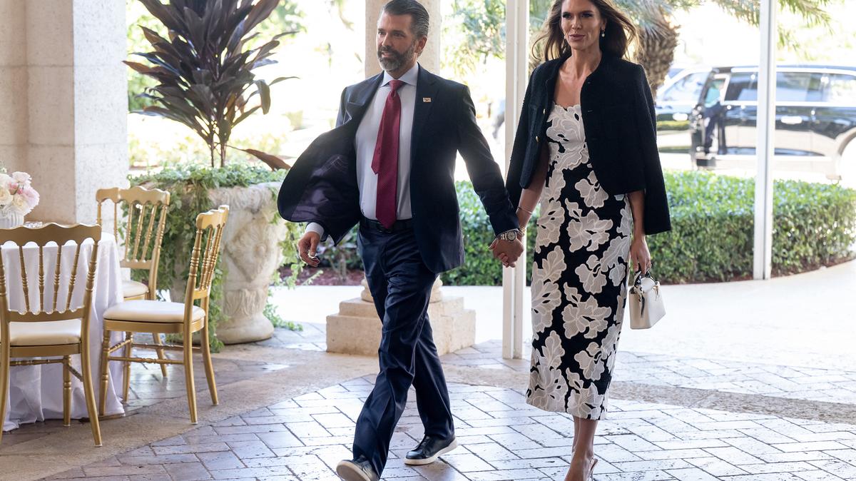 Donald Trump Jr., left, and his fiancee Bettina Anderson arrive to attend the wedding of Dan Scavino, White House Deputy Chief of Staff, and Erin Elmore, the Department of State Director of Art in Embassies, at Mar-a-Lago in Palm Beach, Florida, Feb. 1, 2026. (Saul Loeb/AFP/Getty Images/TNS)