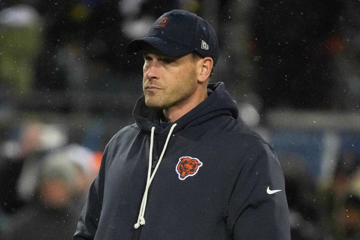  Chicago Bears head coach Ben Johnson looks on during warmups before an NFC Divisional Round game against the Los Angeles Rams at Soldier Field. 