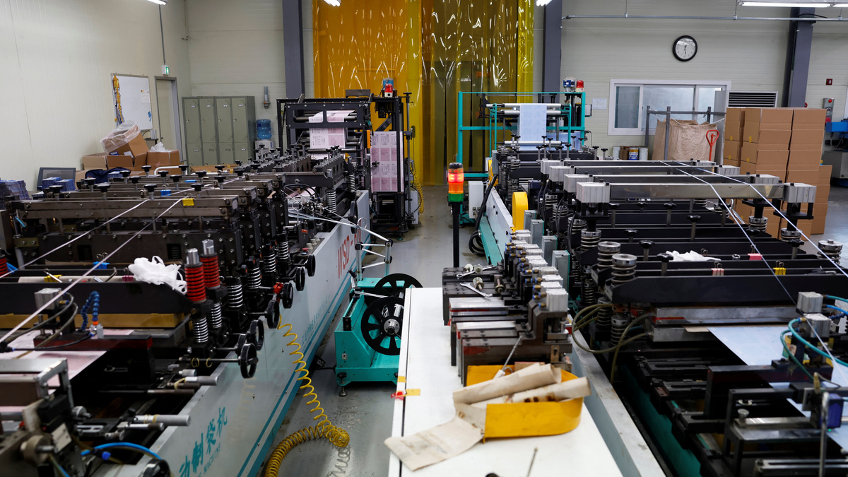 FILE PHOTO: Part of a production line for facial mask pouches stands idle at a factory in Pyeongtaek, South Korea, April 8, 2026. REUTERS/Kim Soo-hyeon/File Photo