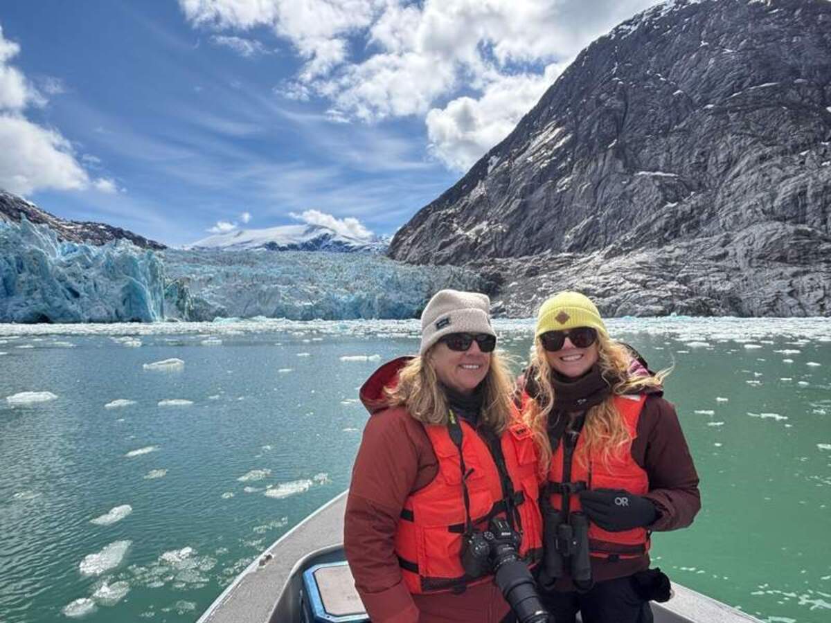  Mimi and Meagan on a skiff near Dawes Glacier. Photo credit: Mimi Slawoff 