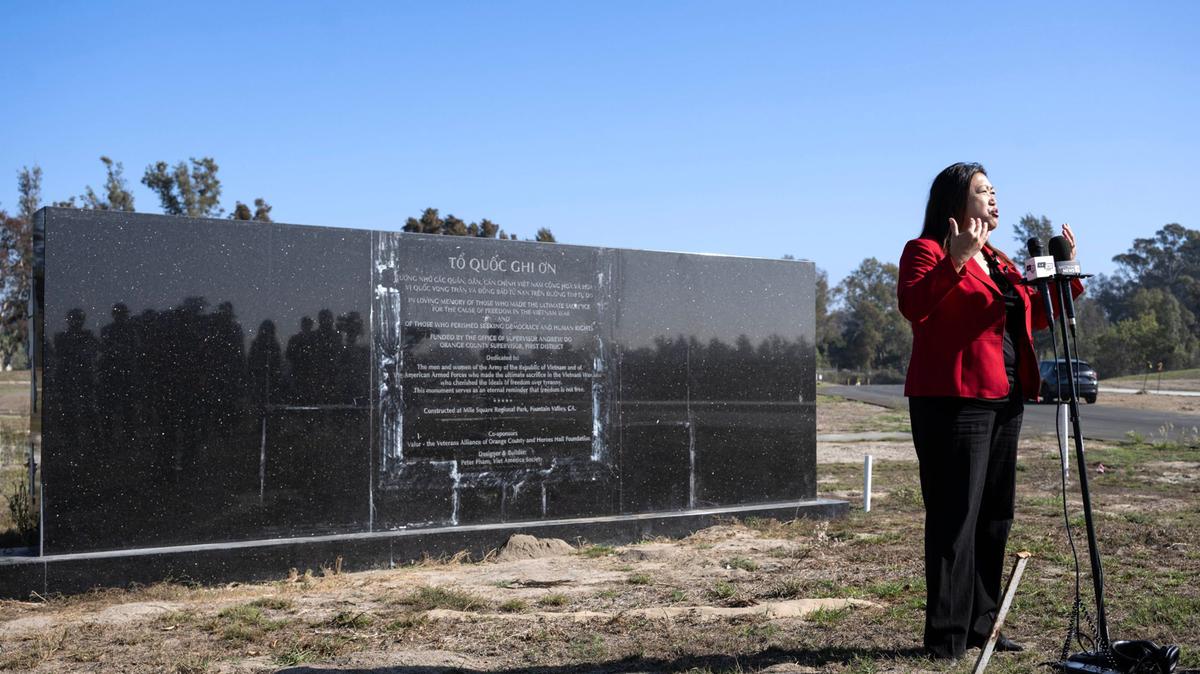 Orange County Supervisor Janet Nguyen speaks in front of the unfinished, cracked, and dilapidated Vietnam War Memorial in Fountain Valley's Mile Square Park in November 2025. On March 4, 2026, Orange County officials tore down the unfinished Vietnam War wall memorial paid for with $1 million in discretionary funds from former Supervisor Andrew Do. (Mindy Schauer/The Orange County Register/TNS)
