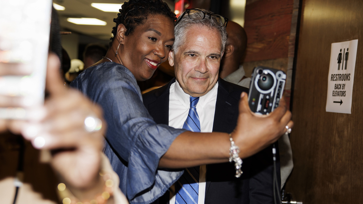 District Attorney Larry Krasner, right, greets supporters during his election night party at the Pipeline Philly coworking space on May 20, 2025, in Philadelphia. Krasner defeated challenger Patrick Dugan both in the Democratic primary and in the general election. (Monica Herndon/The Philadelphia Inquirer/TNS)