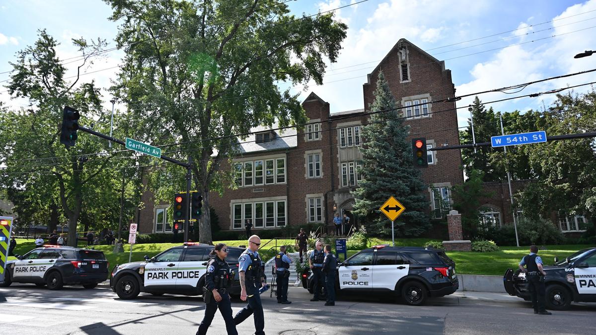 Police and first responders work at the scene of a shooting near Annunciation Church and Catholic School in Minneapolis, on Aug. 27, 2025.