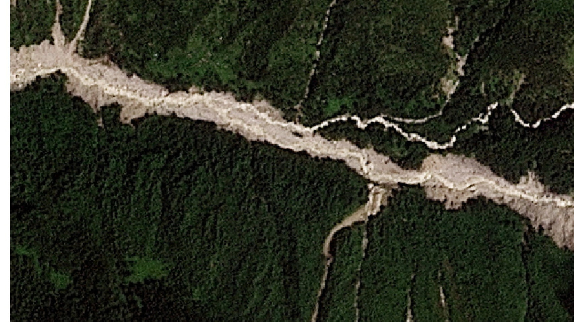 Nepal lake breaks banks, water level rising, district official says 
