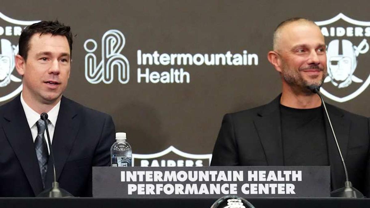  Feb 10, 2026; Henderson, NV, USA; Las Vegas Raiders coach Klint Kubiak (left) and general manager John Spytek at introductory press conference at Intermountain Health Performance Center. Mandatory Credit: Kirby Lee-Imagn Images | Kirby Lee-Imagn Images 