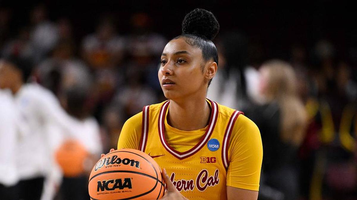  Mar 24, 2025; Los Angeles, California, USA; USC Trojans guard JuJu Watkins (12) during pregame warmups before an NCAA Tournament second round game against the Mississippi State Bulldogs at Galen Center. Mandatory Credit: Robert Hanashiro-Imagn Images | Robert Hanashiro-Imagn Images 