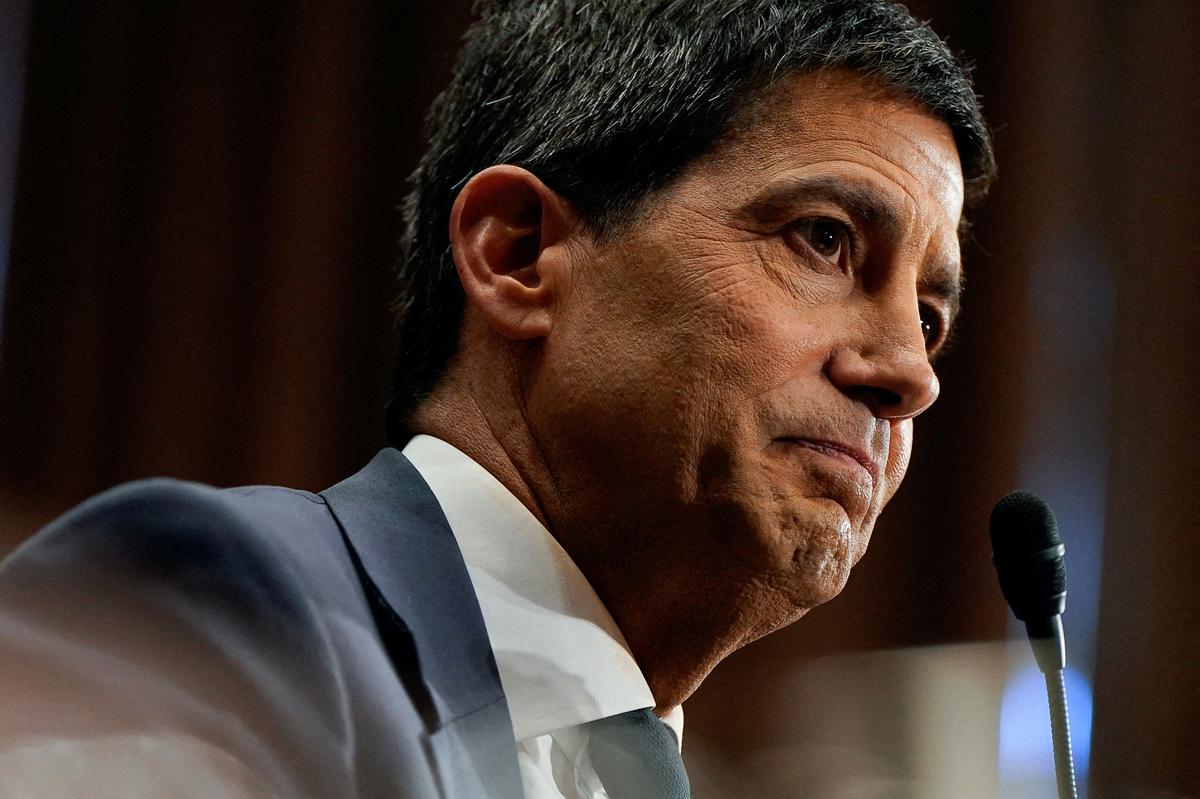 FILE PHOTO: Kevin Warsh, U.S. President Donald Trump's nominee to be next chair of the Federal Reserve, attends a Senate Banking Committee confirmation hearing to testify, on Capitol Hill in Washington, D.C., U.S., April 21, 2026. REUTERS/Elizabeth Frantz/File Photo/File Photo