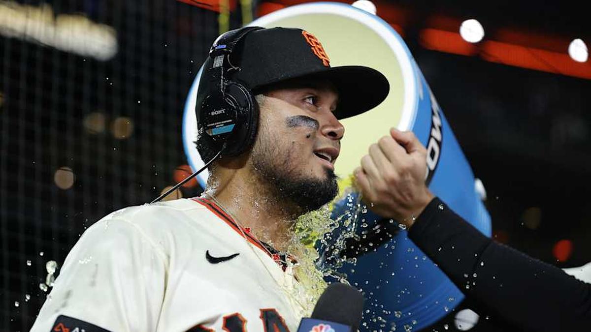  May 4, 2026; San Francisco, California, USA; San Francisco Giants second baseman Luis Arraez (1) is dunked with powerade after the game against the San Diego Padres at Oracle Park. | Kelley L Cox-Imagn Images 