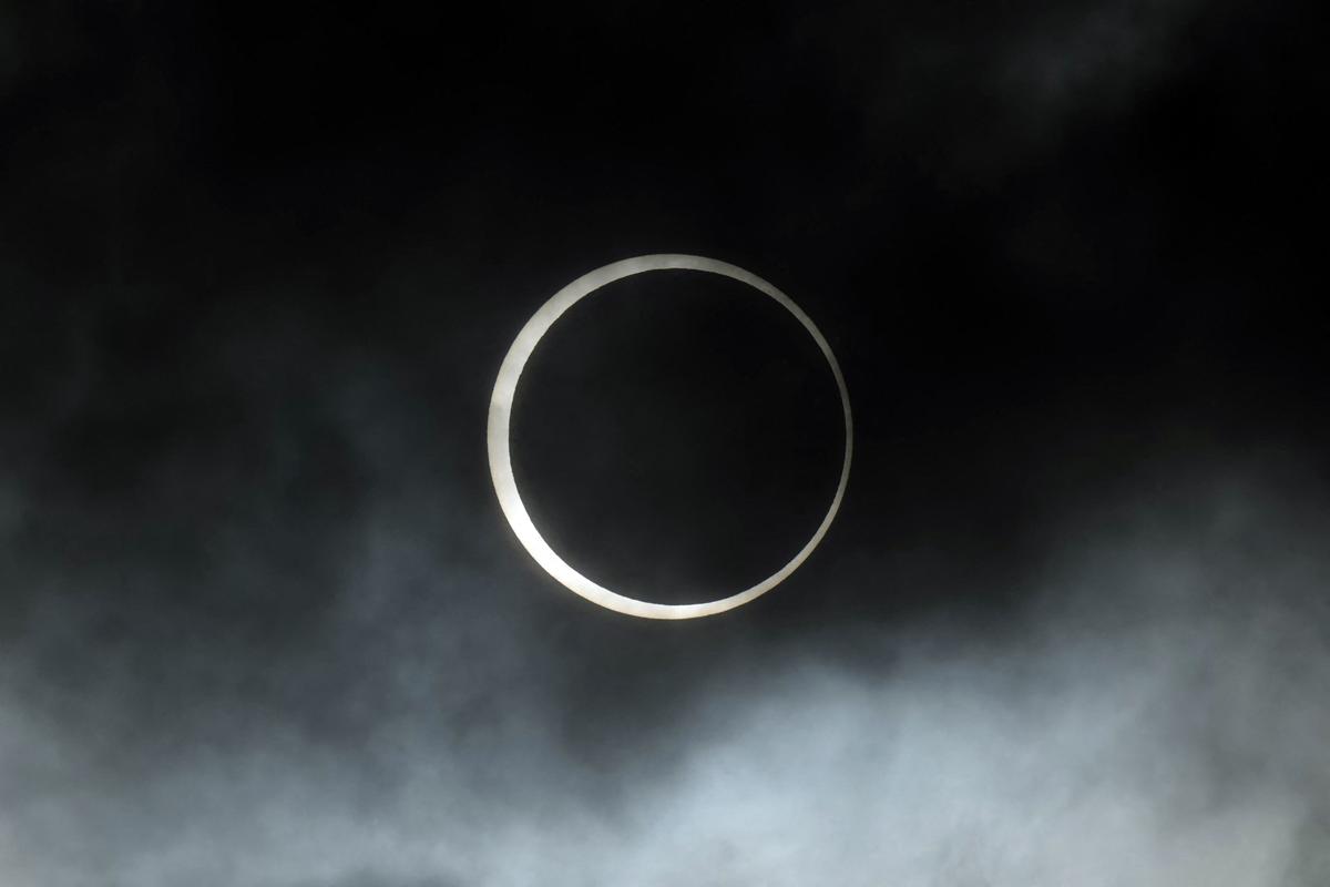 The moon crosses in front of the sun during the annular solar eclipse in Puerto San Julian, Santa Cruz province, Argentina, on Oct. 2, 2024.