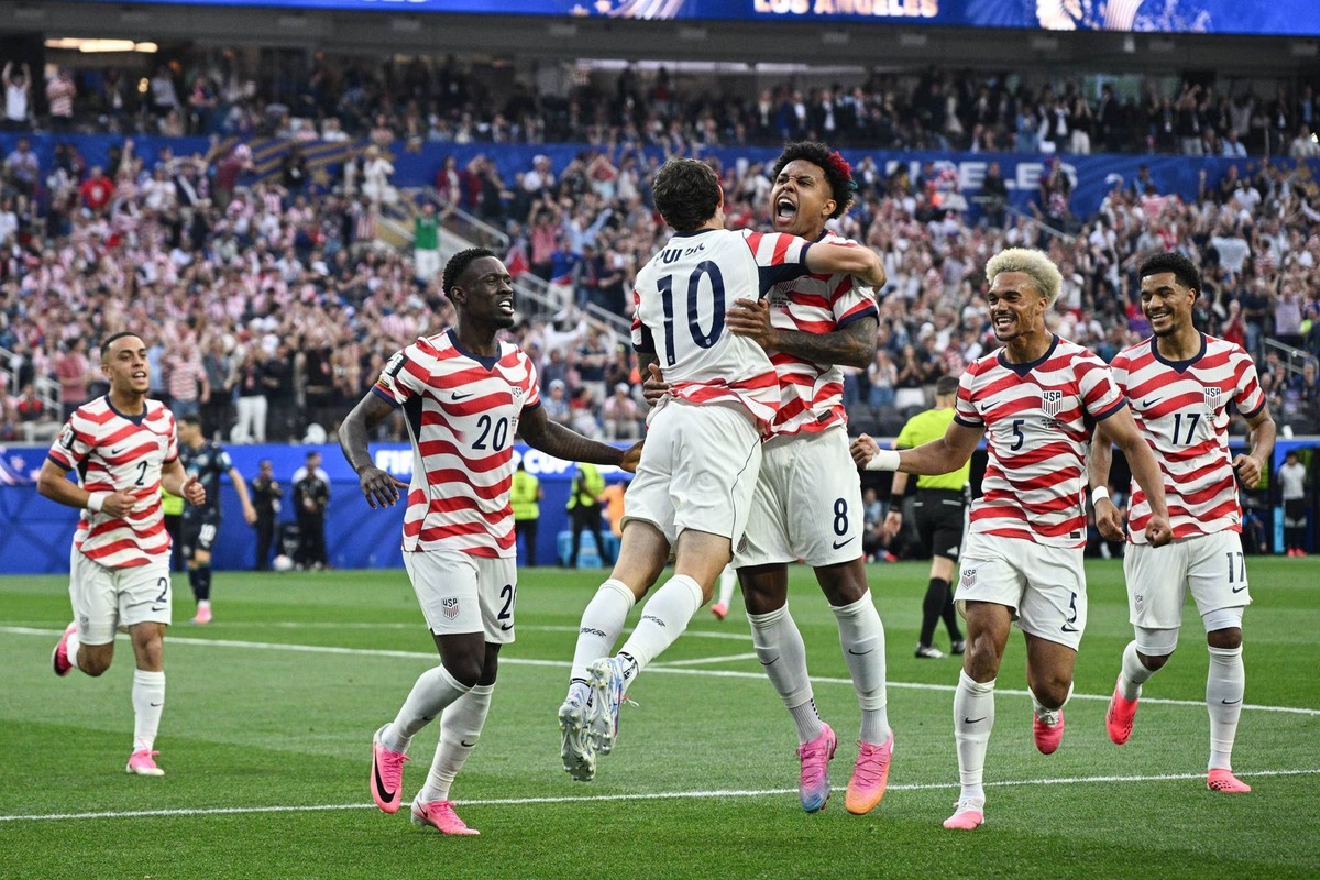  Christian Pulisic, Weston McKennie, Folarin Balogun and Antonee Robinson of United States celebrate their side's first goal, an own goal by Damian Bobadilla of Paraguay (not pictured), during the FIFA World Cup 2026 Group D match between USA and Paraguay at Los Angeles Stadium on June 12, 2026 in Los Angeles, California. (Photo by Sebastian Frej/Getty Images) Photo by Sebastian Frej/Getty Images