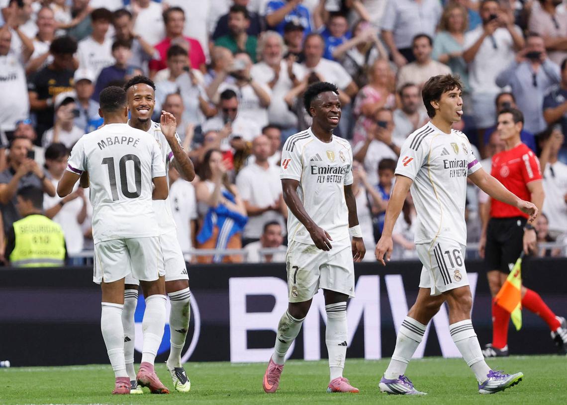  Real Madrid's Brazilian defender #03 Eder Militao (L) celebrates a goal with his teammates. Photo by Oscar DEL POZO / AFP) (Photo by OSCAR DEL POZO/AFP via Getty Images