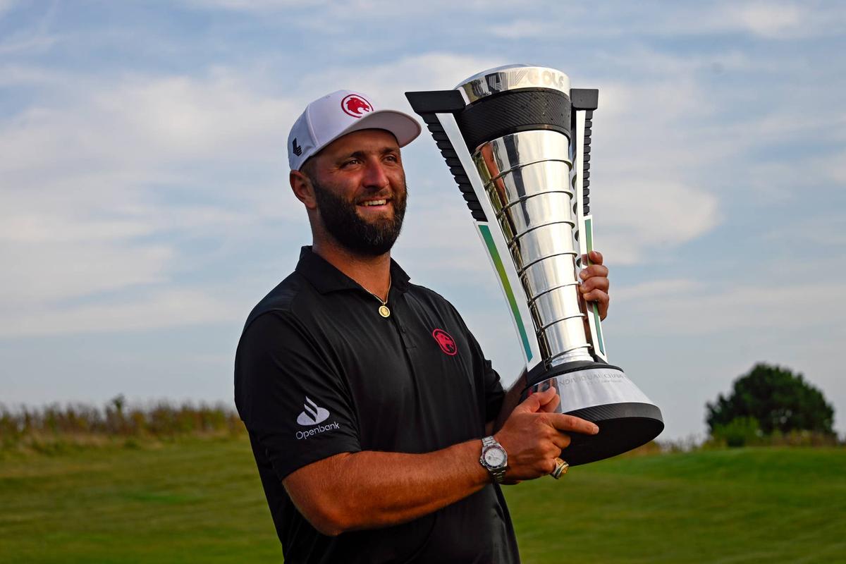 Jon Rahm of the Legion XIII holds the individual trophy after winning the LIV Golf Chicago tournament at Bolingbrook Golf Club. Matt Marton-Imagn Images