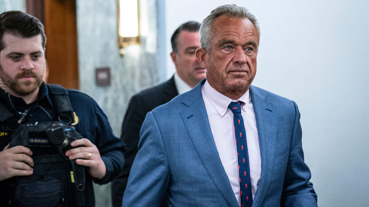 Robert F. Kennedy Jr. meets with senators on Dec. 18, 2024, on Capitol Hill in Washington. A coalition opposing the nominee for health secretary includes faculty members from leading U.S. academic institutions, including public health schools at Yale and Harvard. 
