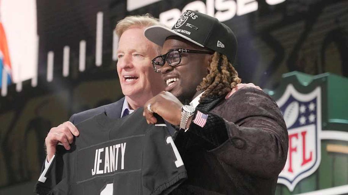  NFL Commissioner Rodger Goodell, left, with Boise State Broncos running back Ashton Jeanty is selected by the Las Vegas Raiders as the number six pick in the first round of the 2025 NFL Draft at Lambeau Field. Mark Hoffman / Milwaukee Journal Sentinel | Mark Hoffman / Milwaukee Journal Sentinel / USA TODAY NETWORK via Imagn Images 