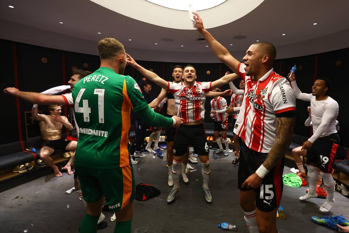  Taylor Harwood-Bellis (C) and Southampton team mates celebrate in the dressing room during the Sky Bet Championship Play Off Semi Final Second Leg match between Southampton and Middlesbrough at St Mary's Stadium on May 12, 2026 in Southampton, England. (Photo by Matt Watson/Southampton FC via Getty Images) Photo by Matt Watson/Southampton FC via Getty Images