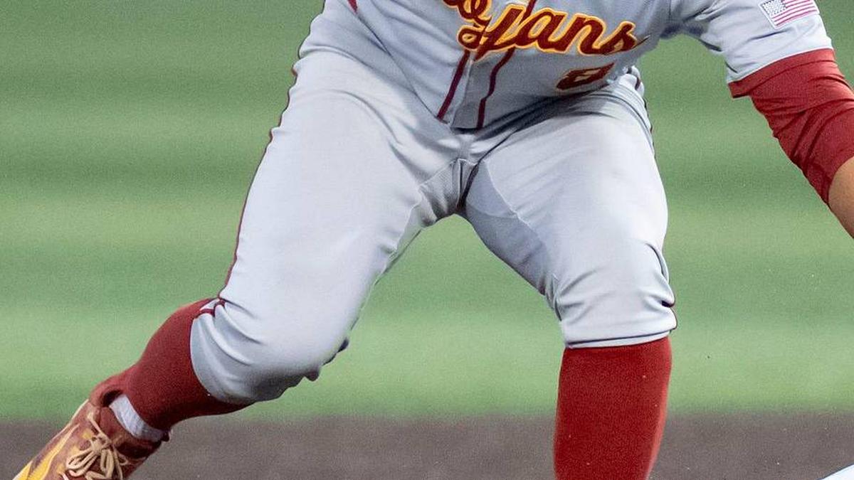  USC's Kevin Takeuchi, left, tags Oregon infielder Ryan Cooney as he slides to second as the Oregon Ducks host the USC Trojans on May 14, 2026, in Eugene, Oregon. | Ben Lonergan/The Register-Guard / USA TODAY NETWORK via Imagn Images 