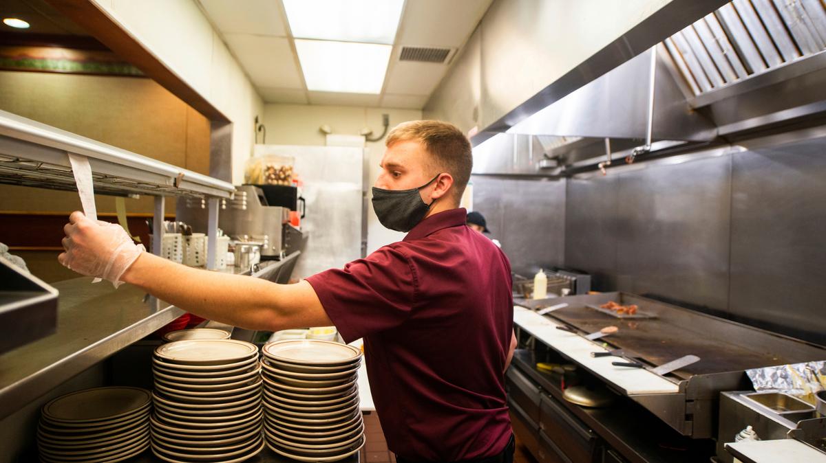A ghost kitchen, or virtual restaurant, uses an existing business to create a new menu available almost exclusively through delivery, and frequently through third-party delivery services such as DoorDash, GrubHub, Postmates, Seamless and Uber Eats. Photo from Valley Diary in Latrobe, Pa. (Shane Dunlap/Pittsburgh Tribune-Review via AP)