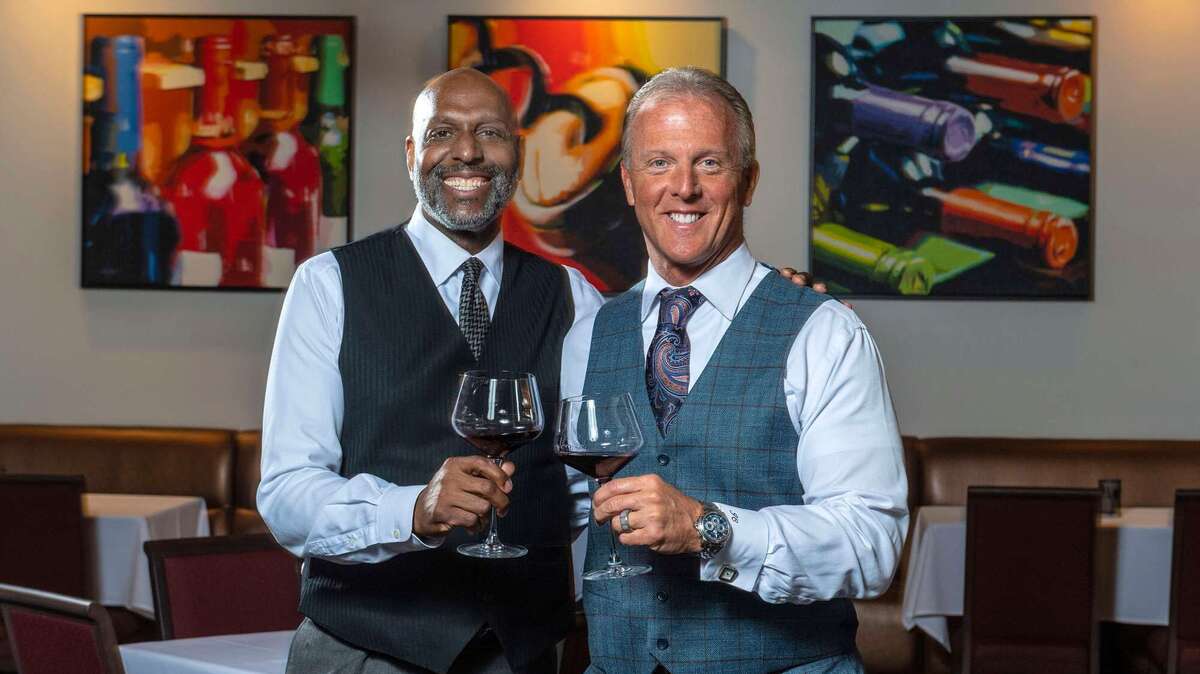 Owners of The Winery Restaurant & Wine Bar, William Lewis and JC Clow, at their  Tustin restaurant on Wednesday, May 12, 2021. They are celebrating their 25th Anniversary in 2021.  (Photo by Mark Rightmire, Orange County Register/SCNG)