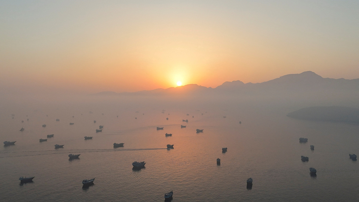 FILE PHOTO: A drone view shows vessels in the Strait of Hormuz, as seen from Musandam, Oman, June 15, 2026. REUTERS/Stringer/File Photo