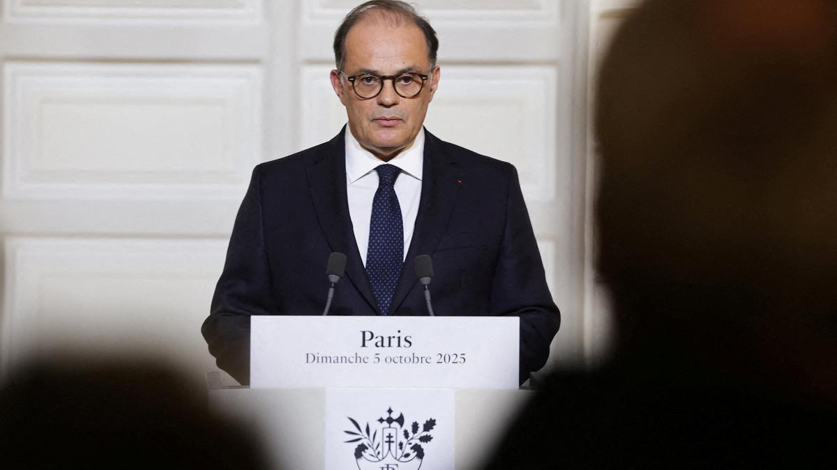 FILE PHOTO: French Secretary-General of the Elysee Palace, Emmanuel Moulin announces the first batch of names of the new ministers who make up the new cabinet, at the Elysee Palace, in Paris, France, 5 October 2025.   Christophe Petit Tesson/Pool via REUTERS/File Photo