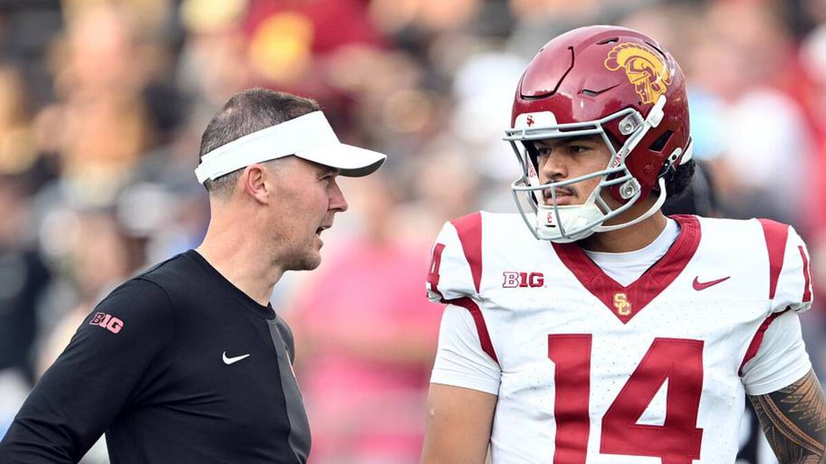  Sep 13, 2025; West Lafayette, Indiana, USA; Southern California Trojans quarterback Jayden Maiava (14) talks with Southern California Trojans head coach Lincoln Riley before the game against the Purdue Boilermakers at Ross-Ade Stadium. Mandatory Credit: Marc Lebryk-Imagn Images | Marc Lebryk-Imagn Images 
