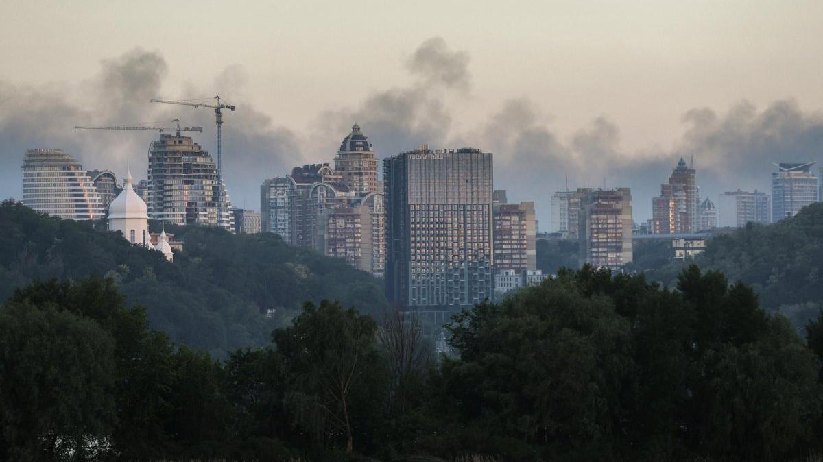 Smoke rises over the Kyiv skyline on Sunday following Russian strikes on Ukraine. Photo by Sergey Dolzhenko/EPA