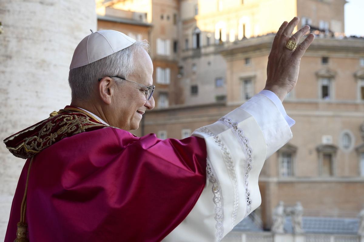 Newly elected Pope Leo XIV, Robert Prevost, addresses the crowd on the main central loggia balcony overlooking St. Peter’s Square on May 08, 2025, in Vatican City, Vatican.