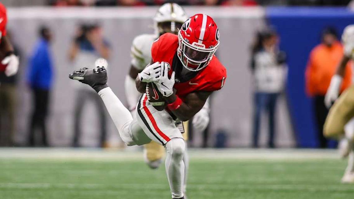  Nov 28, 2025; Atlanta, Georgia, USA; Georgia Bulldogs wide receiver Zachariah Branch (1) catches a pass against the Georgia Tech Yellow Jackets in the fourth quarter at Mercedes-Benz Stadium. Mandatory Credit: Brett Davis-Imagn Images | Brett Davis-Imagn Images 