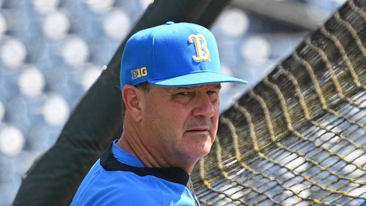  Jun 14, 2025; Omaha, Neb, USA; UCLA Bruins head coach John Savage watches the team warm up before the game against the Murray State Races at Charles Schwab Field. Mandatory Credit: Steven Branscombe-Imagn Images | Steven Branscombe-Imagn Images 