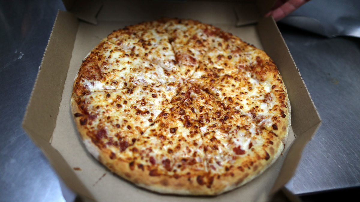 Domino's forecasts muted annual same-store sales as competition ...