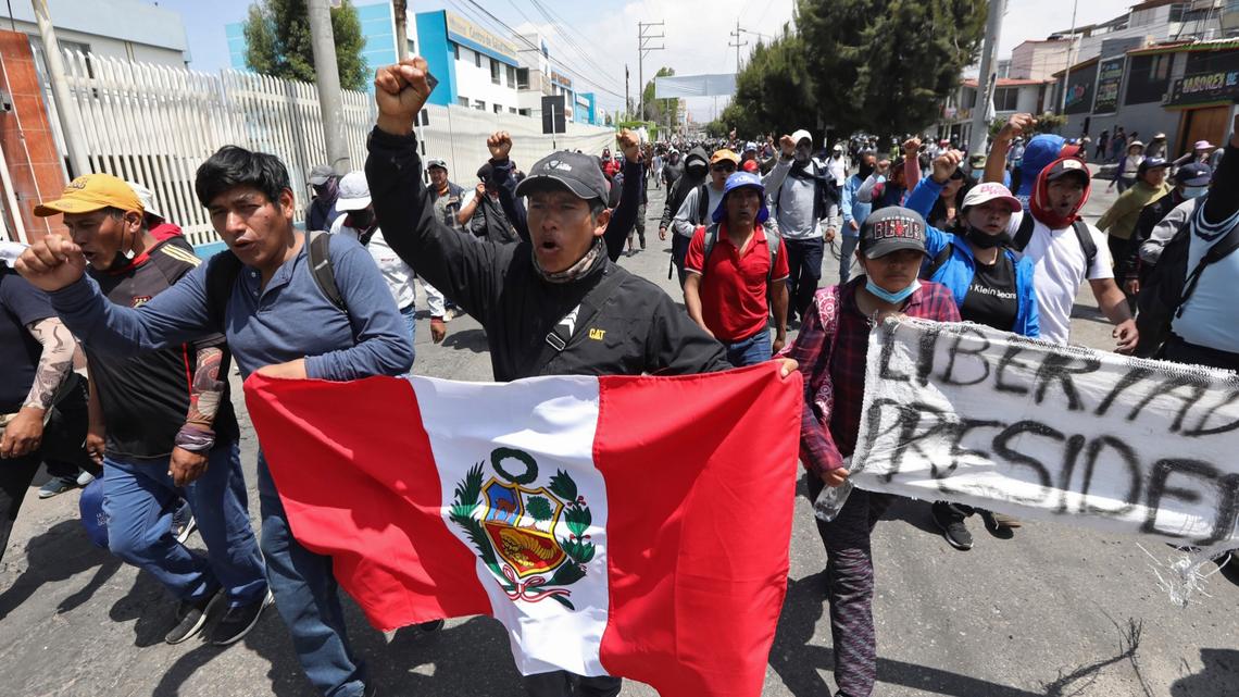 Supporters of ousted Peruvian President Pedro Castillo protest his detention in Arequipa, Peru, on Dec. 14.