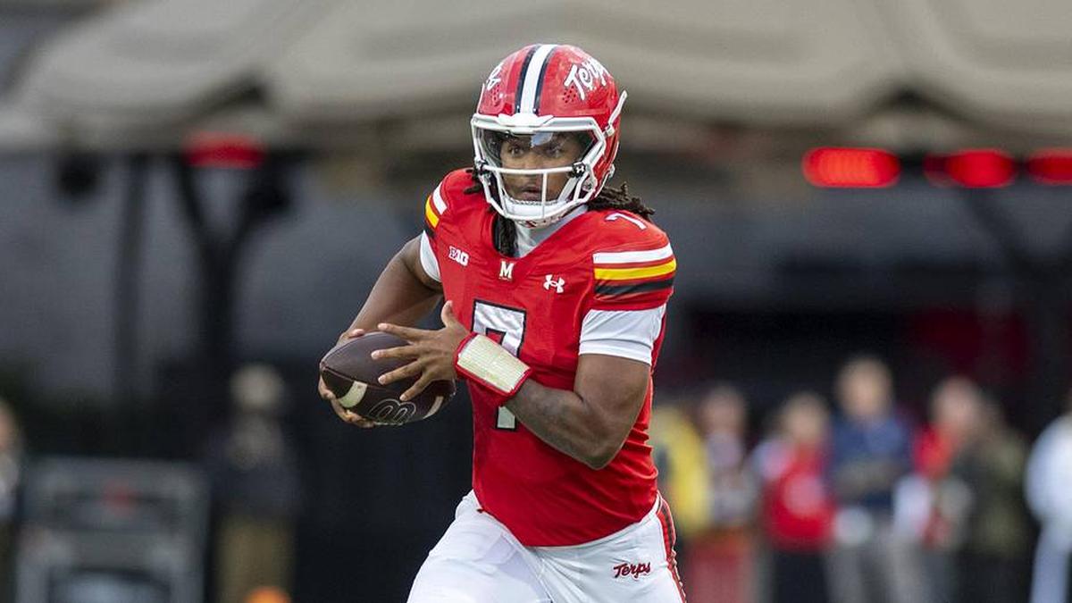  Nov 22, 2025; College Park, Maryland, USA; Maryland Terrapins quarterback Malik Washington (7) scrambles during the first quarter against the Michigan Wolverines at SECU Stadium. Mandatory Credit: Tommy Gilligan-Imagn Images | Tommy Gilligan-Imagn Images 