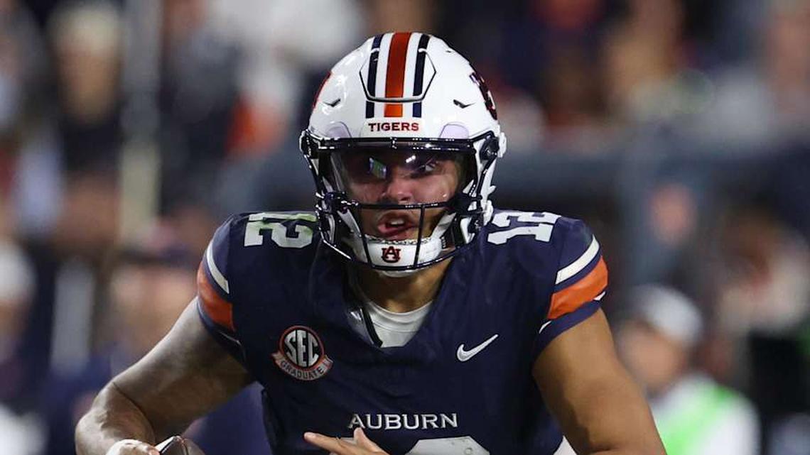  Nov 29, 2025; Auburn, Alabama, USA; Auburn Tigers quarterback Ashton Daniels (12) during the second half against the Alabama Crimson Tide at Jordan-Hare Stadium. Mandatory Credit: John Reed-Imagn Images | John Reed-Imagn Images 