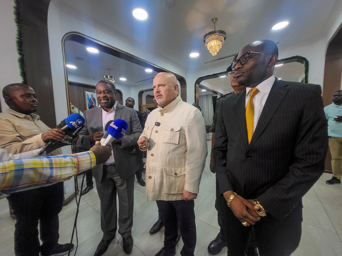 International Criminal Court Prosecutor Karim Khan speaks to members of the media upon his arrival in Kinshasa, Democratic Republic of Congo, February 24, 2025. REUTERS/Benoit Nyemba