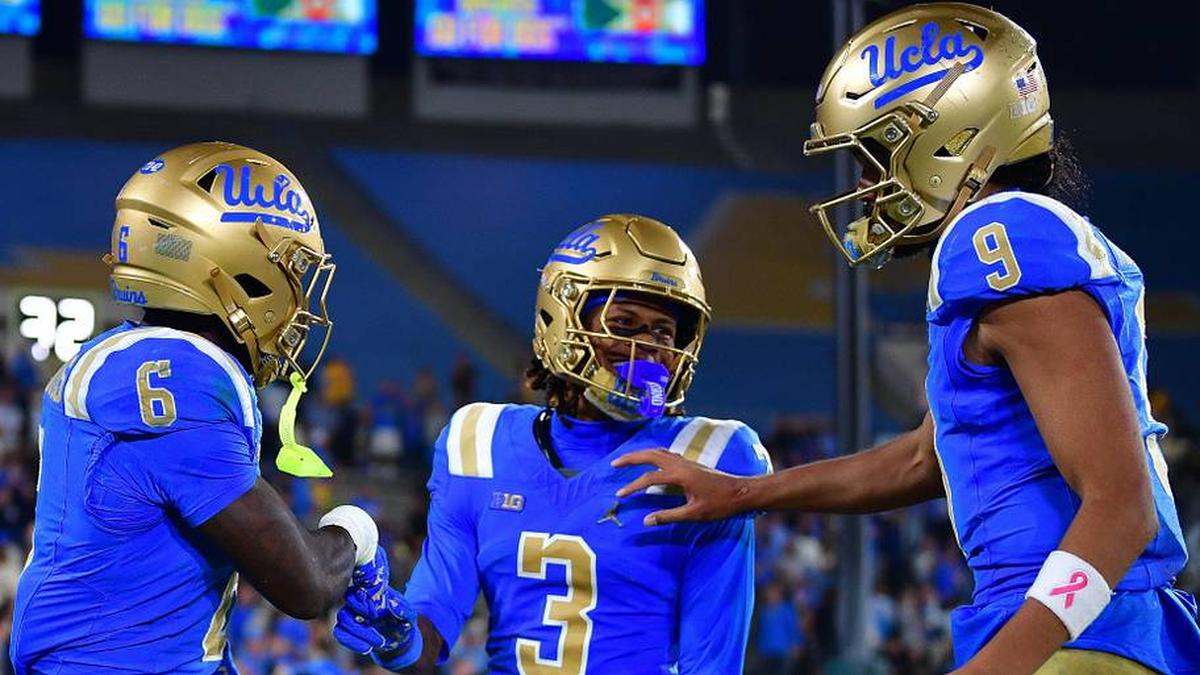  Nov 8, 2025; Pasadena, California, USA; UCLA Bruins running back Anthony Woods (6) celebrates his touchdown scored against the Nebraska Cornhuskers with wide receiver Kwazi Gilmer (3) and quarterback Nico Iamaleava (9) during the second half at the Rose Bowl. Mandatory Credit: Gary A. Vasquez-Imagn Images | Gary A. Vasquez-Imagn Images 
