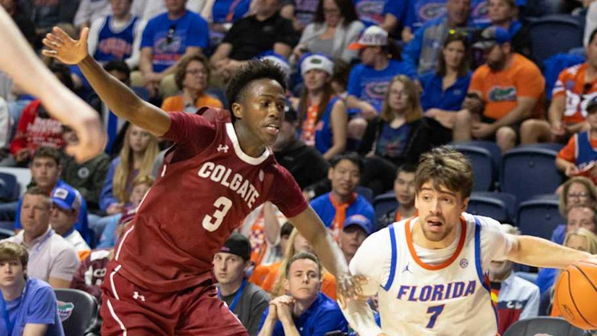  Florida guard Urban Klavzar (7) drives past Colgate guard Jalen Cox (3 during the second half of an NCAA mens basketball game at Steven C. O'Connell Center Exactek arena in Gainesville, FL on Sunday, December 21, 2025. Florida won 90-60. | Alan Youngblood/Gainesville Sun / USA TODAY NETWORK via Imagn Images 