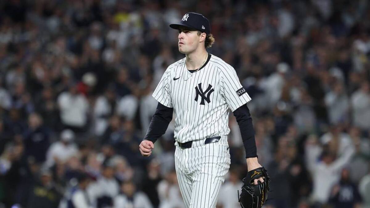  New York Yankees pitcher Cam Schlittler (31) walks of the field after pitching the top of the sixth inning against the Boston Red Sox during game three of the Wildcard round for the 2025 MLB playoffs at Yankee Stadium. | Vincent Carchietta-Imagn Images 