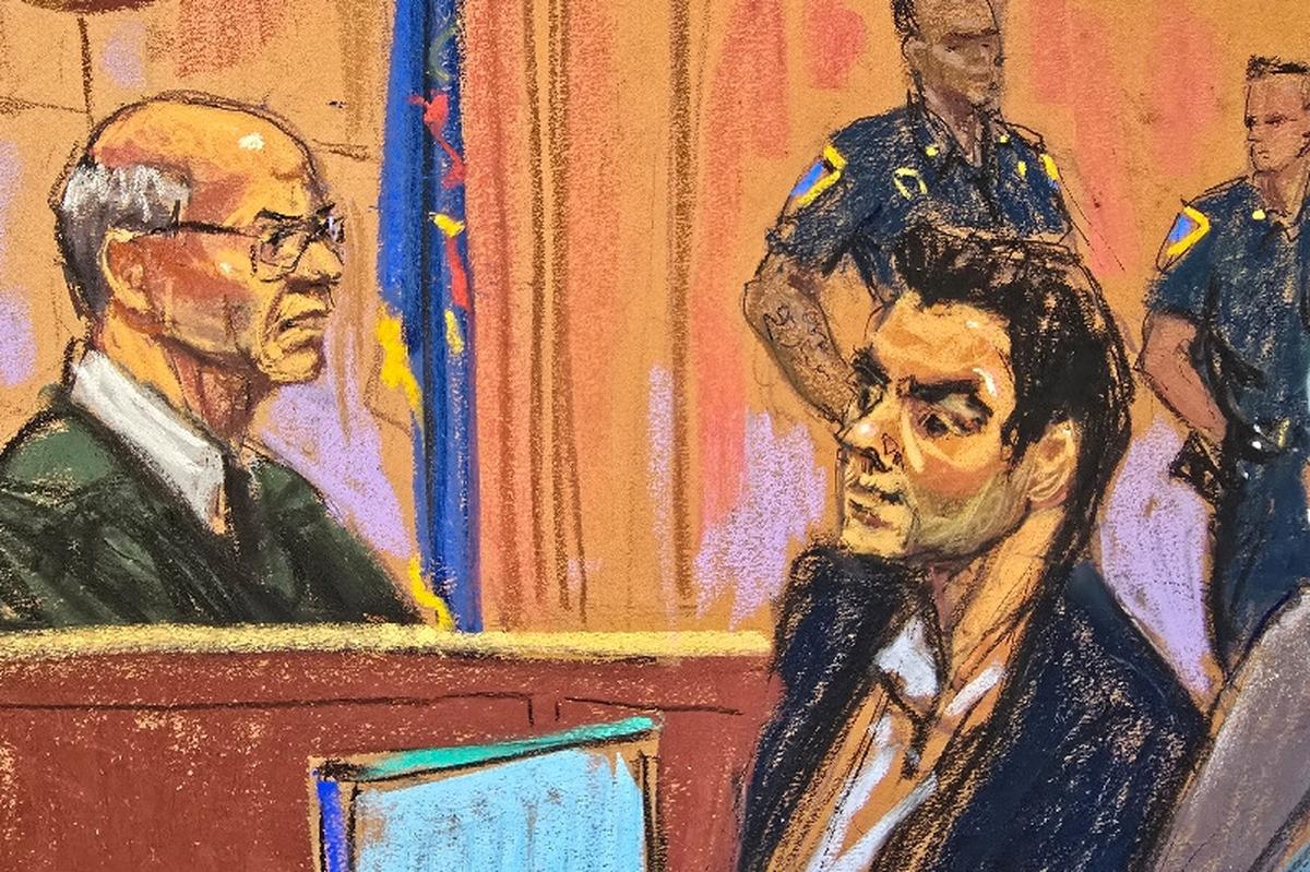 Luigi Mangione, who was arrested in December 2024 and charged with fatally shooting UnitedHealthcare CEO Brian Thompson on a sidewalk in Midtown Manhattan, sits before Justice Gregory Carro at an evidence suppression hearing at the Manhattan Supreme Court in New York City, U.S., May 18, 2026 in a courtroom sketch. REUTERS/Jane Rosenberg